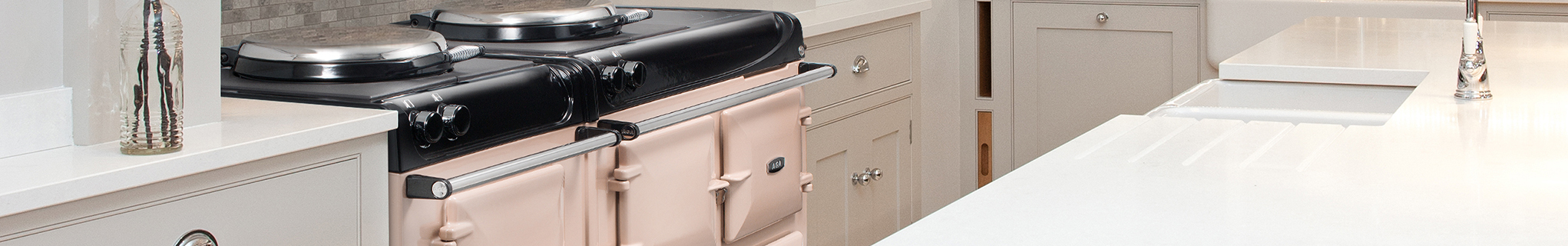 AGA eR3 Series 160 in Blush with white cabinetry 