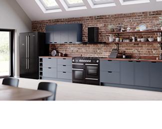 Falcon Nexus Steam in black with gas hob in a blue kitchen 