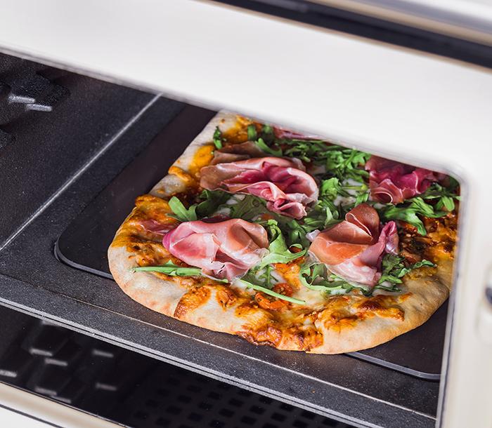 Pizza cooking in the AGA eR7 Series cast-iron ovens