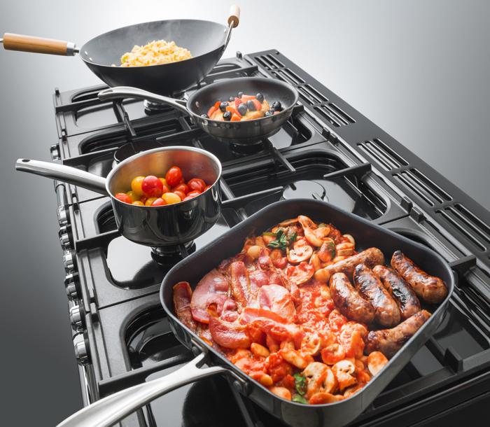 Falcon range cooker gas hob with pans with food